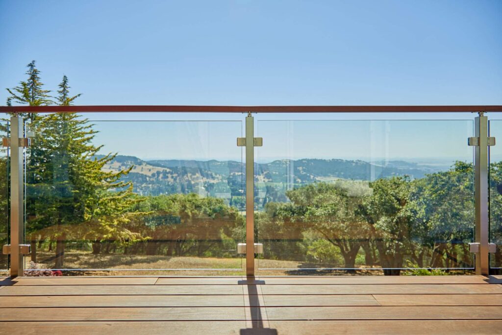 Sleek Wood Handrail with Glass Panels