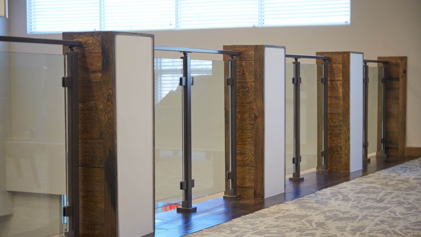 Glass railing with surface mount posts