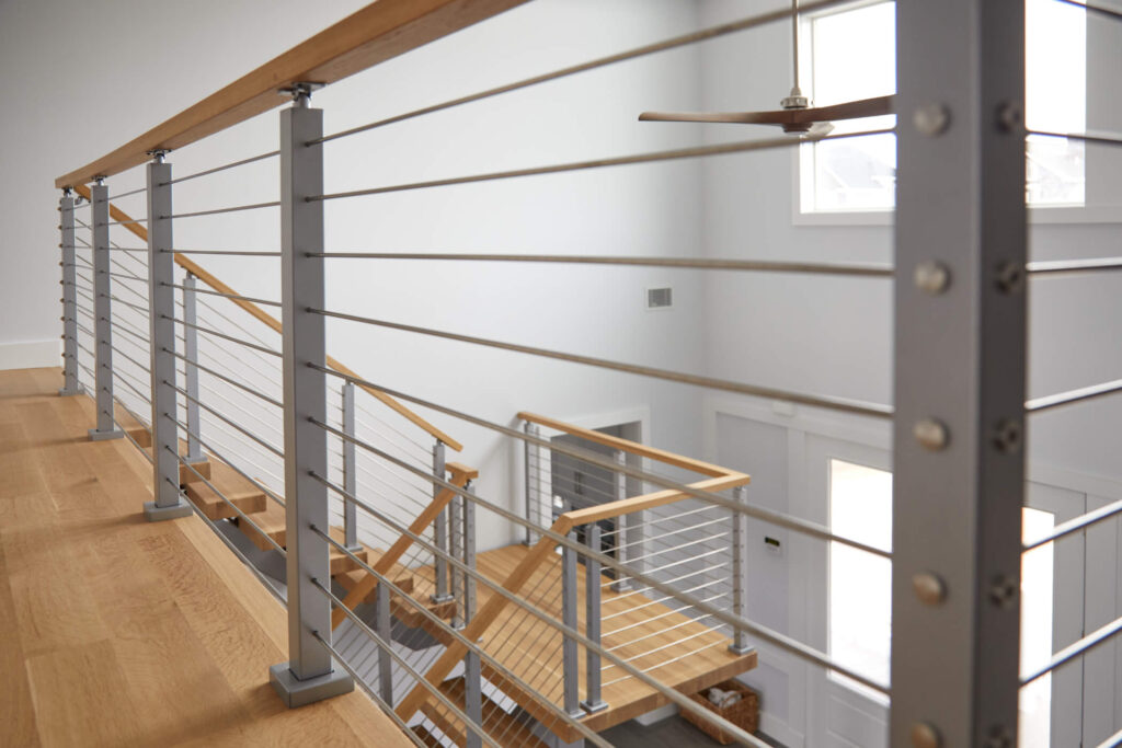 Rod railing with wooden handrail