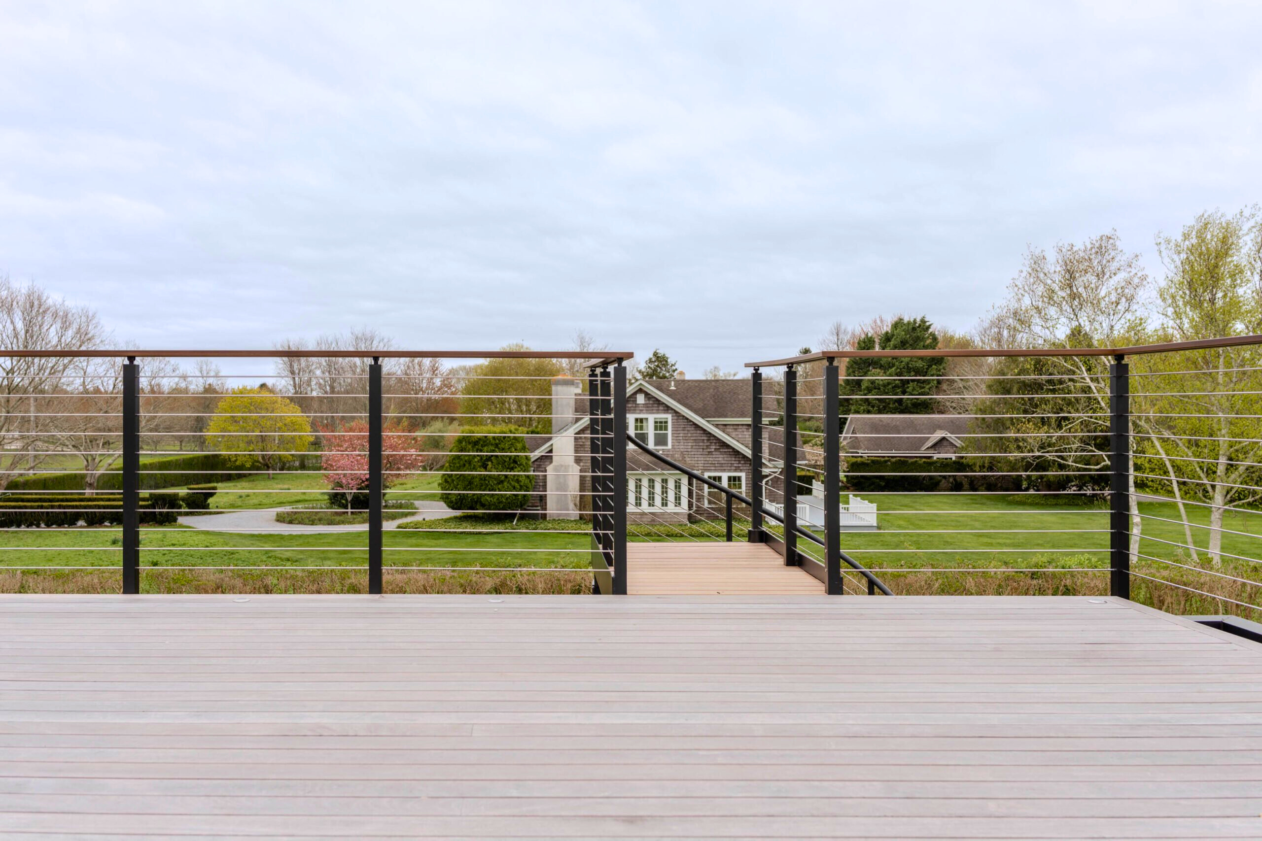 A view from the rooftop, looking over the Signature Railing from Viewrail and the top of the FLIGHT Spiral