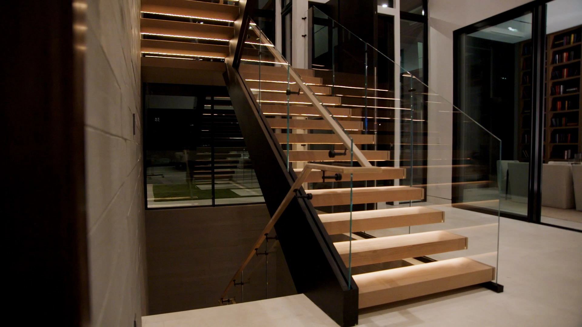 FLIGHT lit up at night from integrated LED lighting.