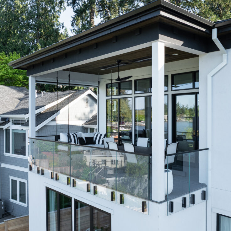 Side Mounted Glass Railing on a Lakeside Balcony