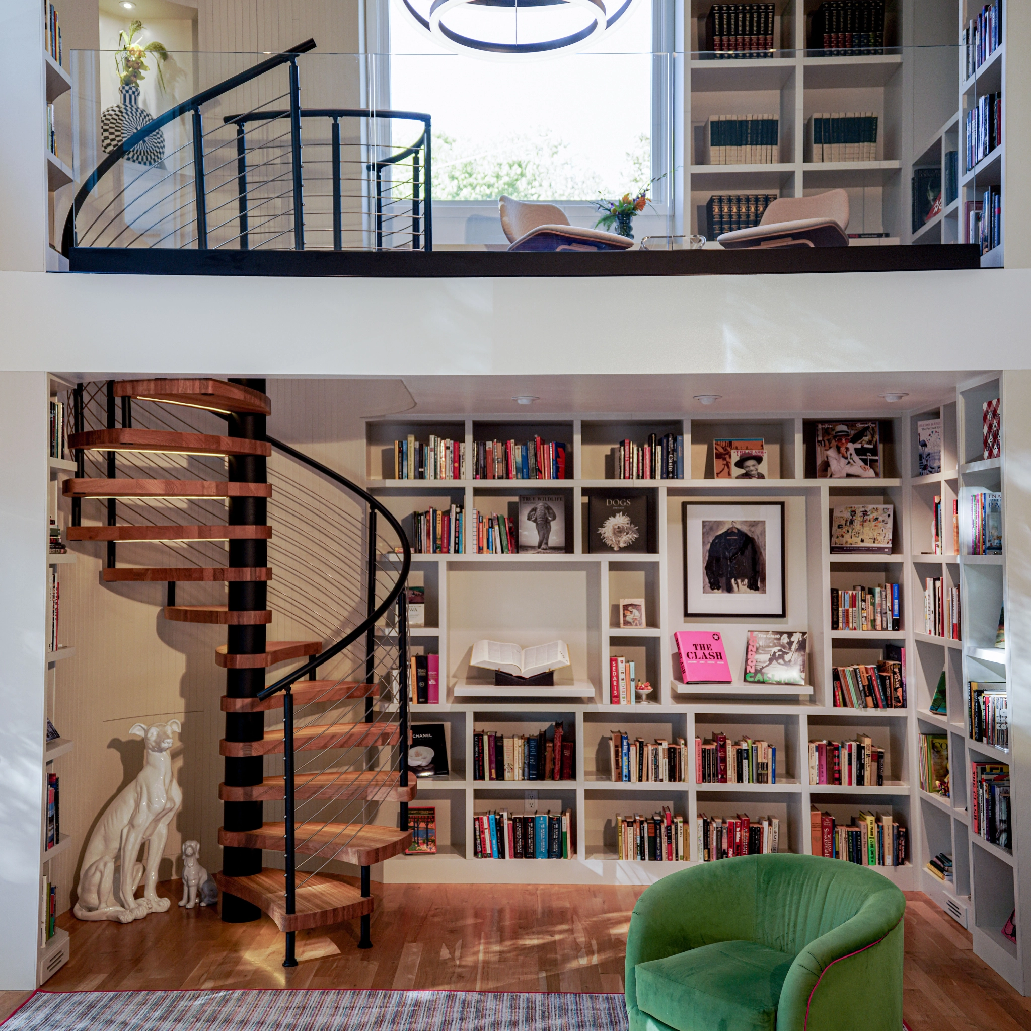 FLIGHT Spiral graces a two-story home library, complete with integrated LED treads.
