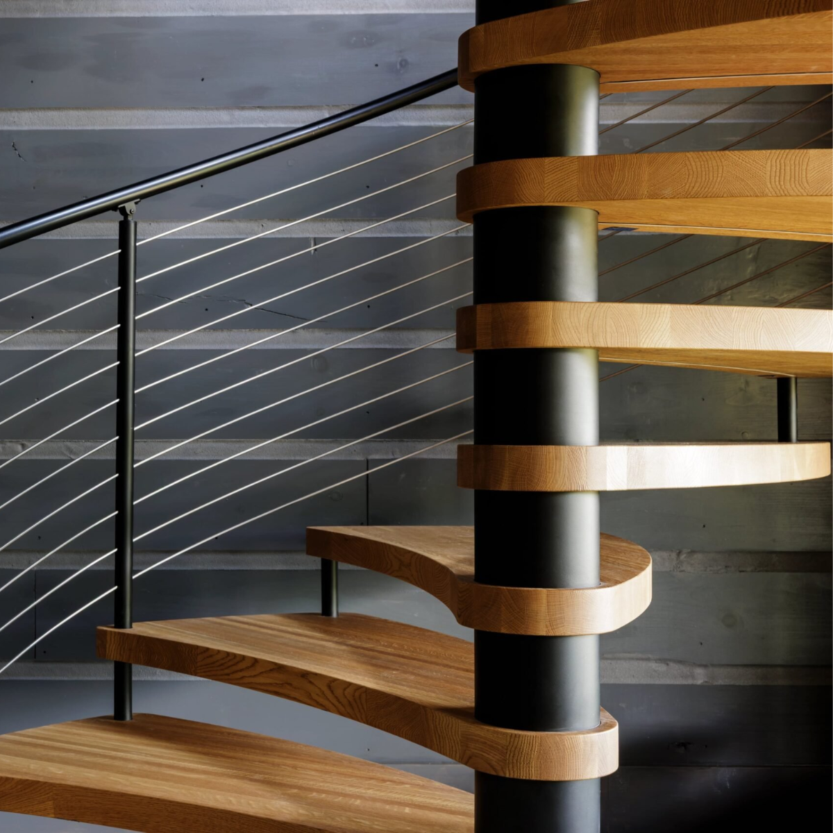 Interior FLIGHT Spiral with stainless steel rod infill and integrated LED treads.