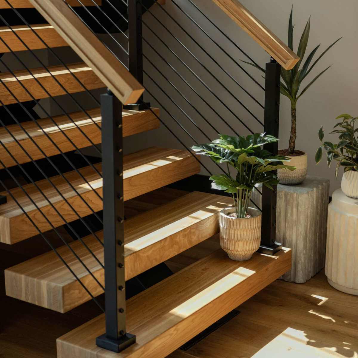 A FLIGHT Mono staircase with Signature railing and rod infill.
