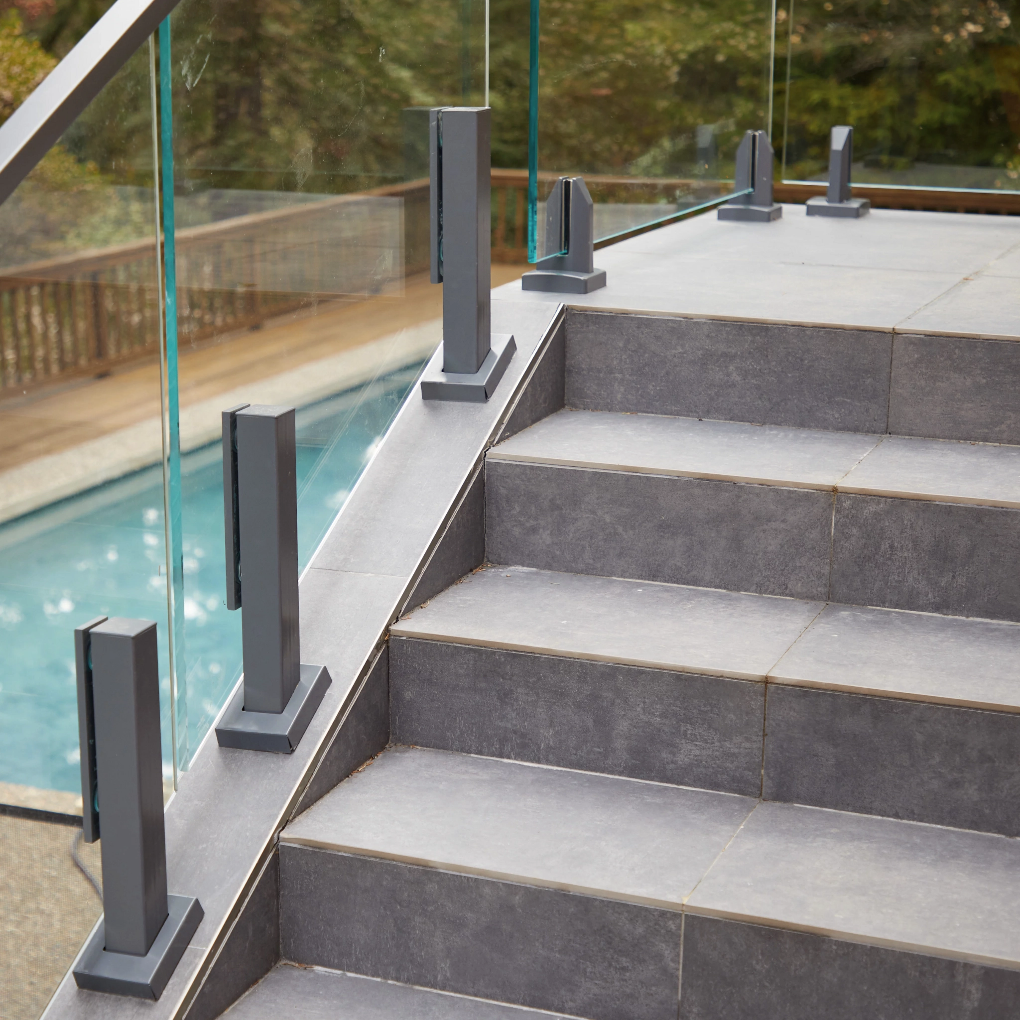 Ascend Talons move up a concrete stair with Talon Spigots on the landing above.