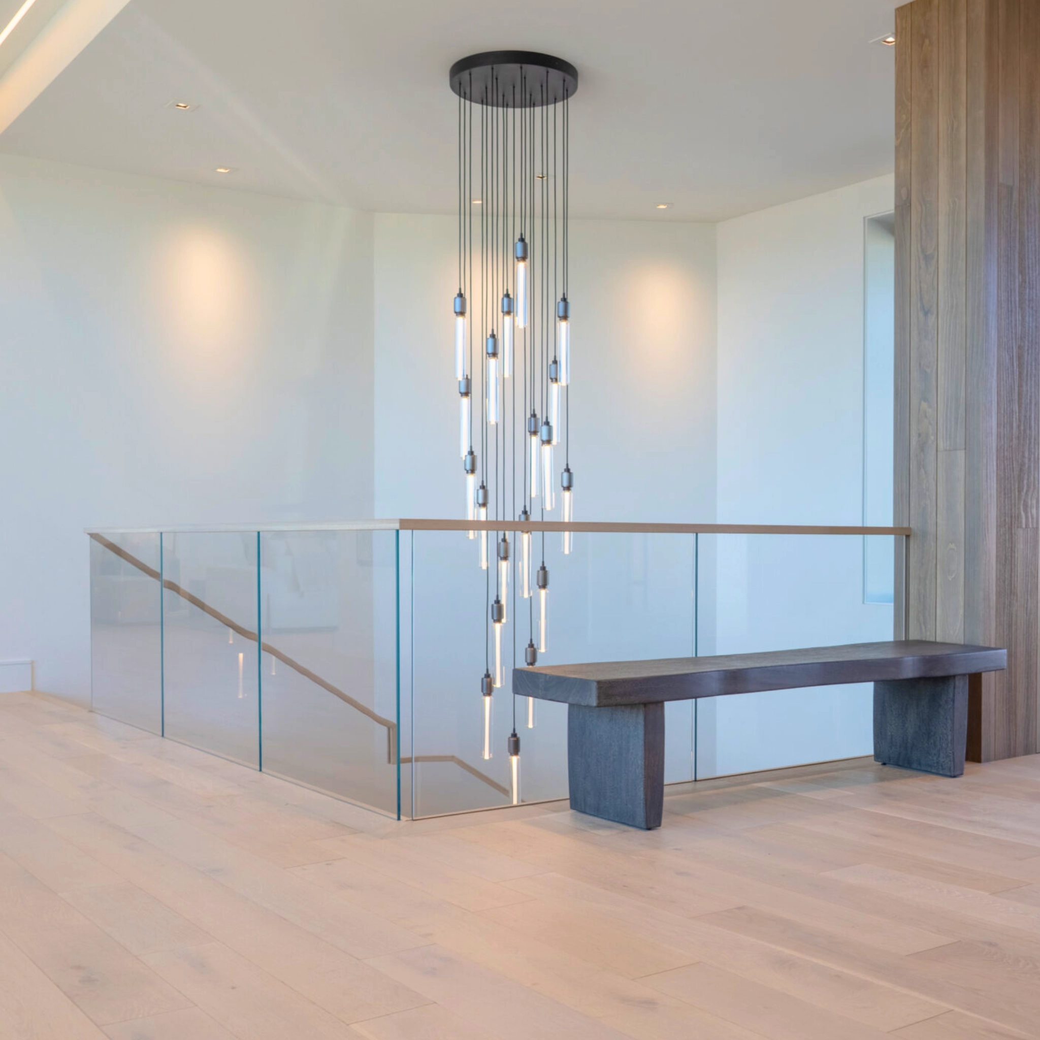 A Hidden Side Mount glass system lets the flooring shine.