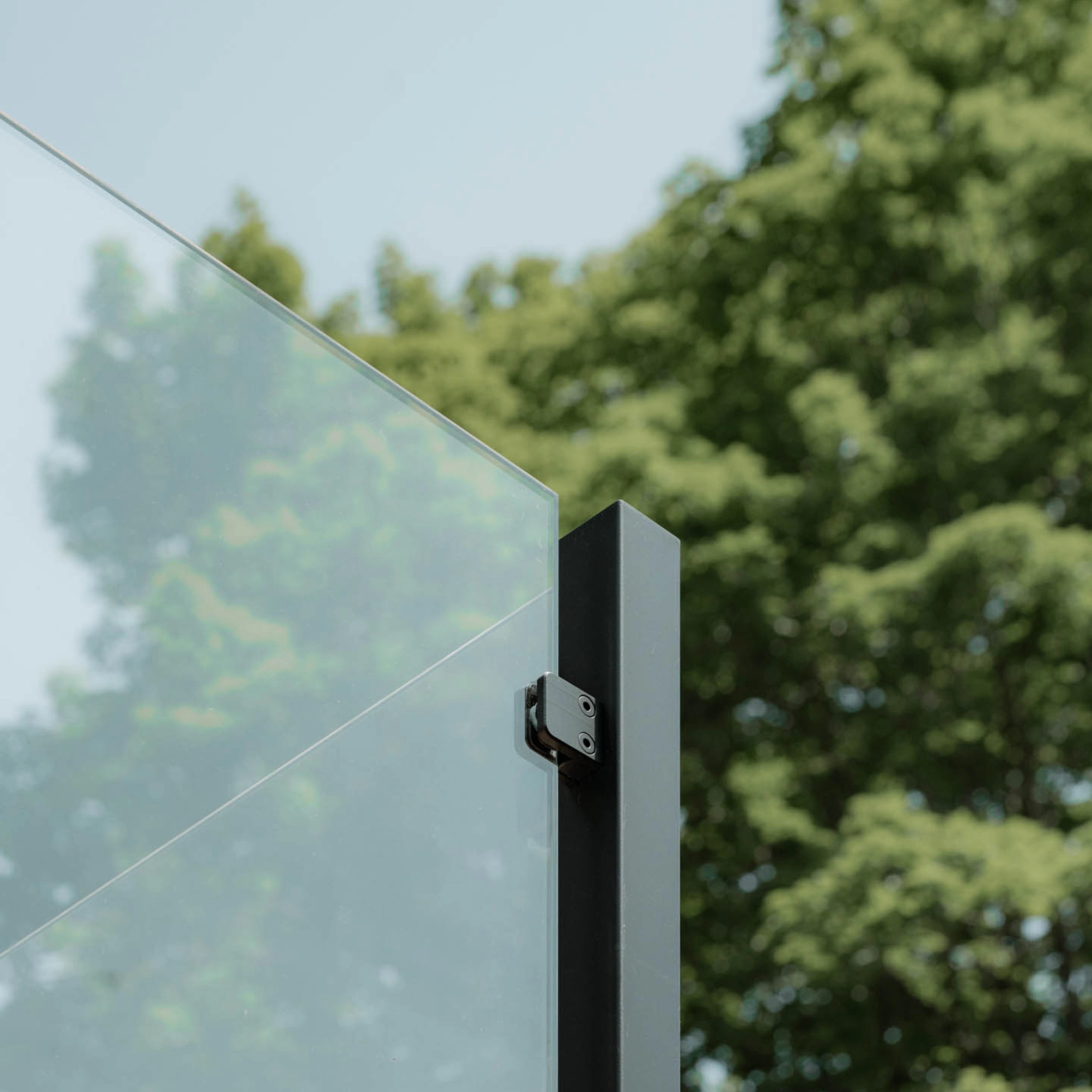 Close up on a corner post in an exterior glass post system.