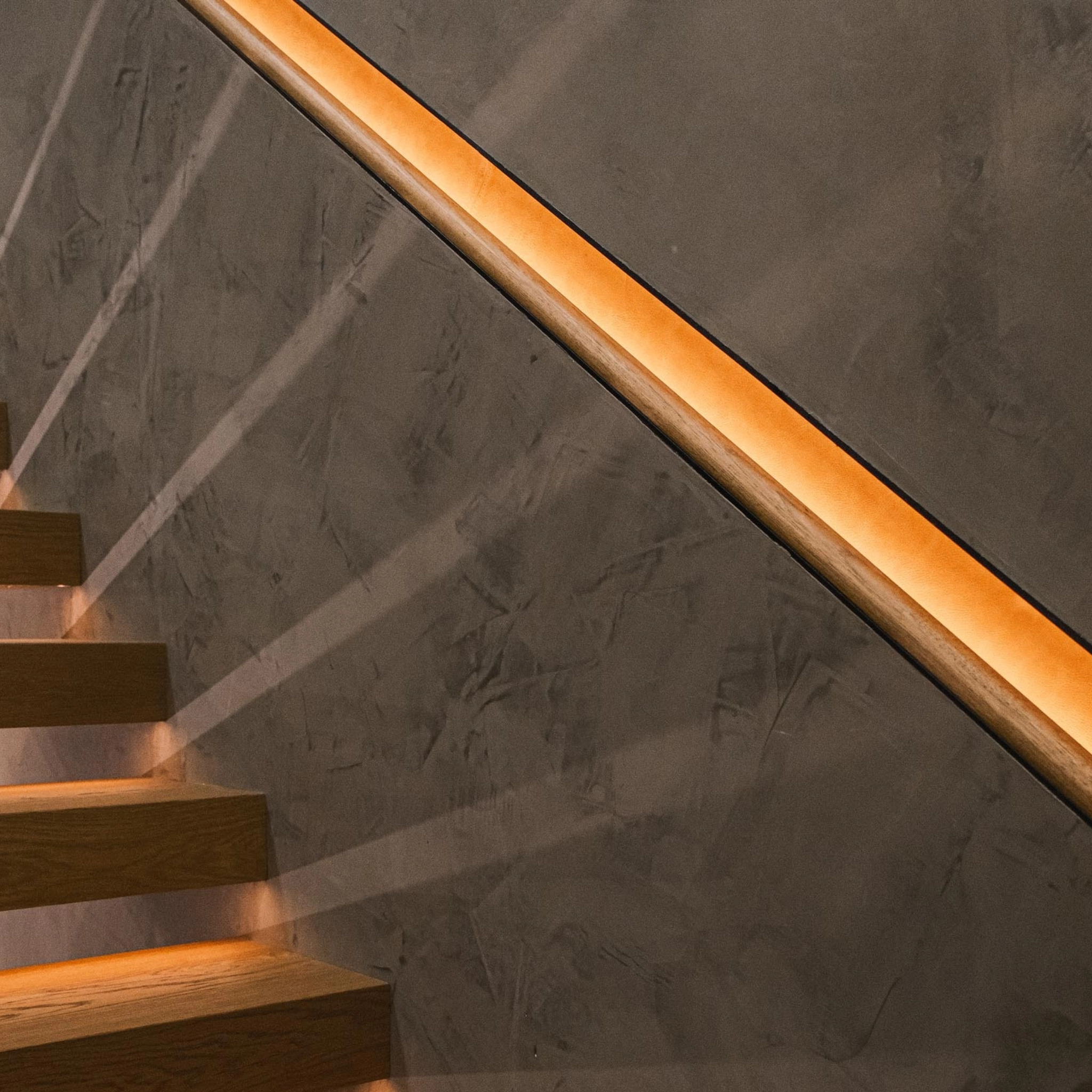 Recessed Handrail on the wall over a FLIGHT Cantilever stair system.